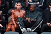 Kim cogita levar Kanye à Justiça após feat. da filha com Diddy