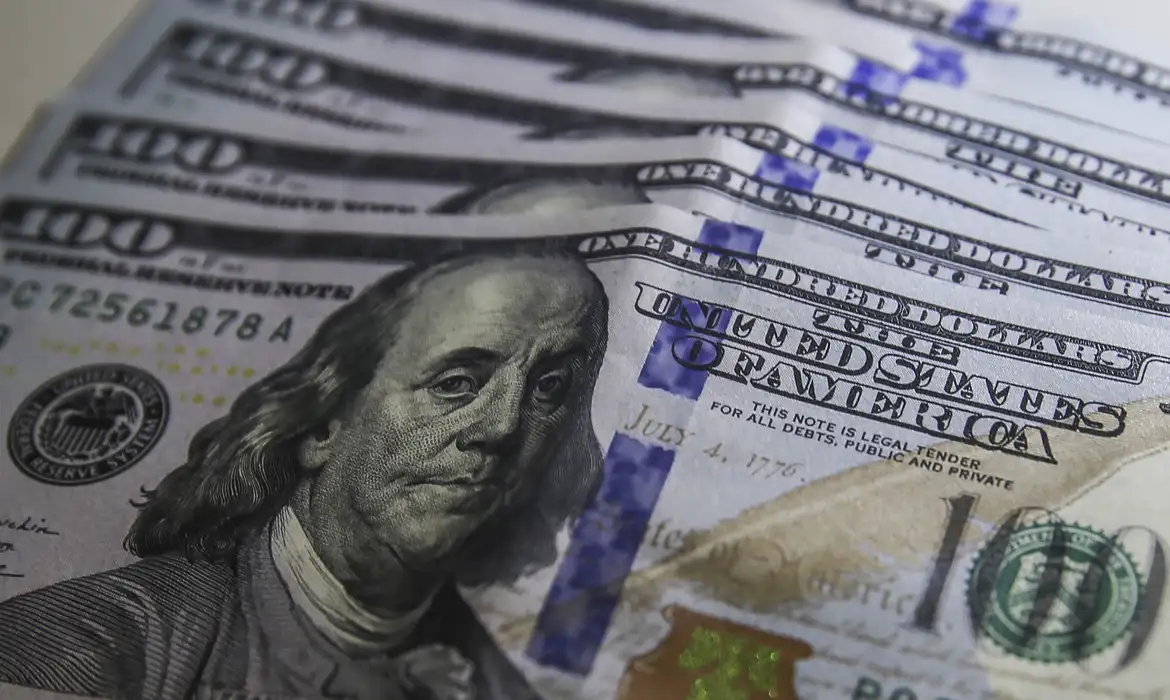 Cédulas e moeda de dólar americano